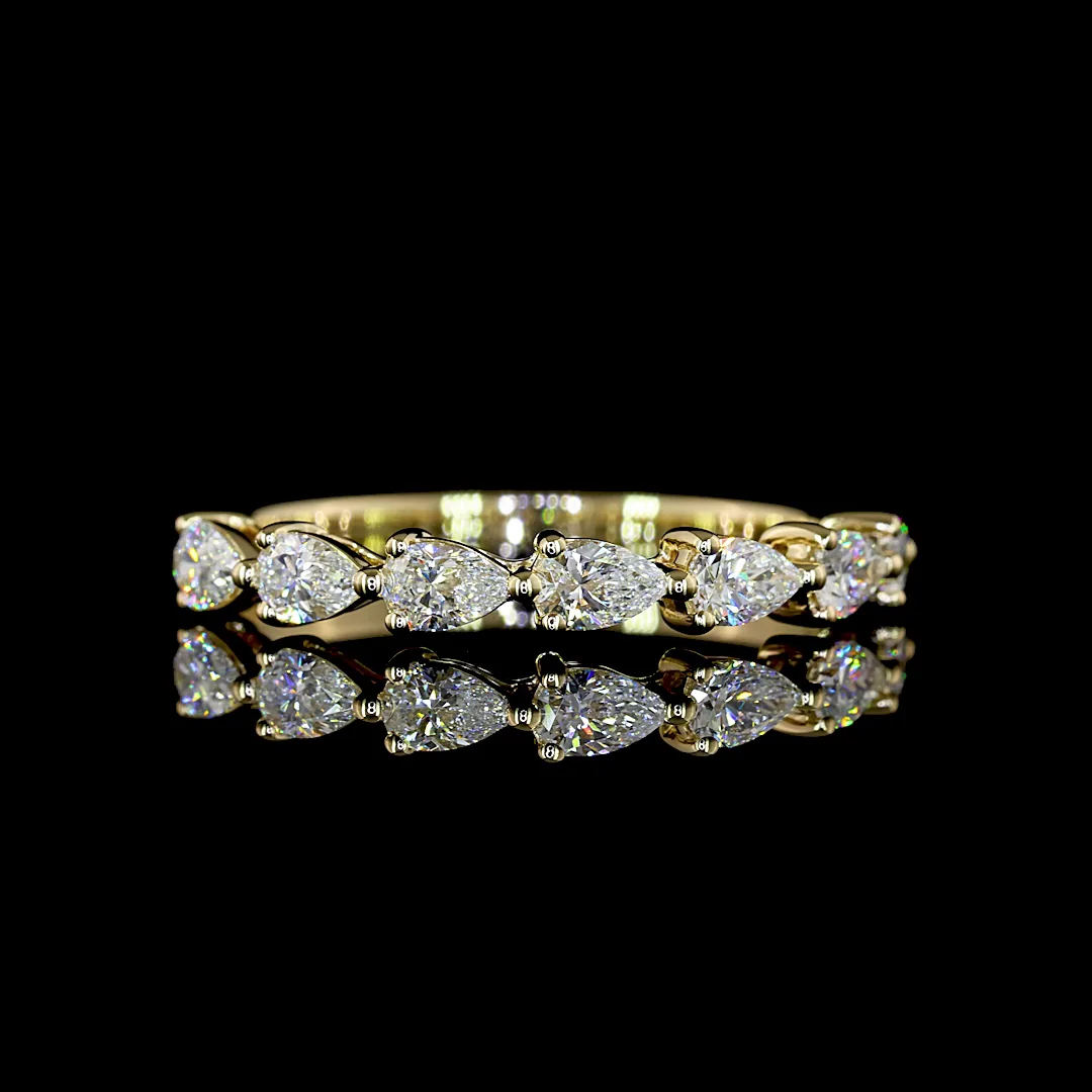 0.65 Cts 14k Yellow Gold Pear Shape 7 Stones Eternity Band - Video