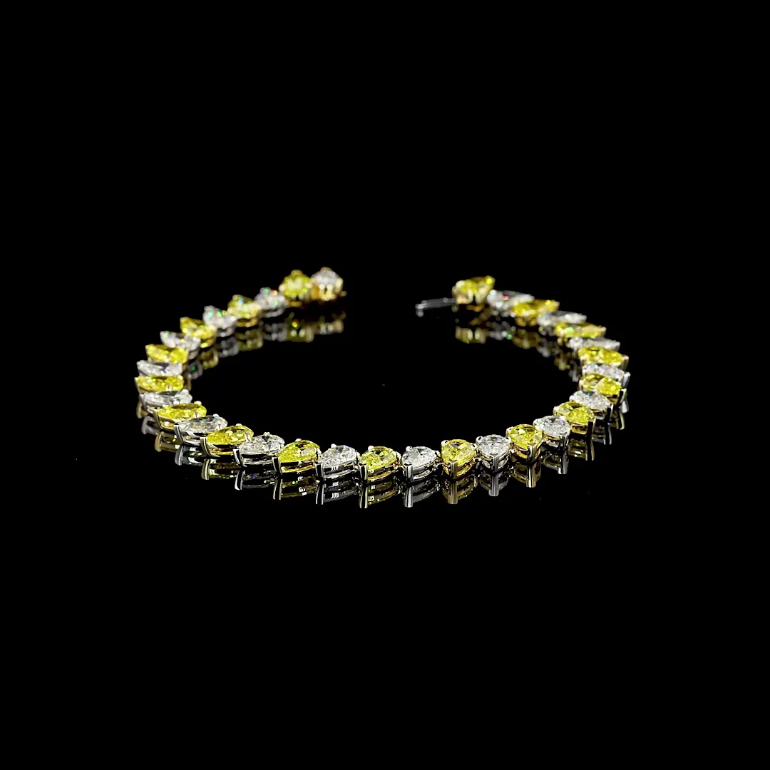 17.27 Cts 14k Two Tone Pear Shape Tennis Bracelet - Video