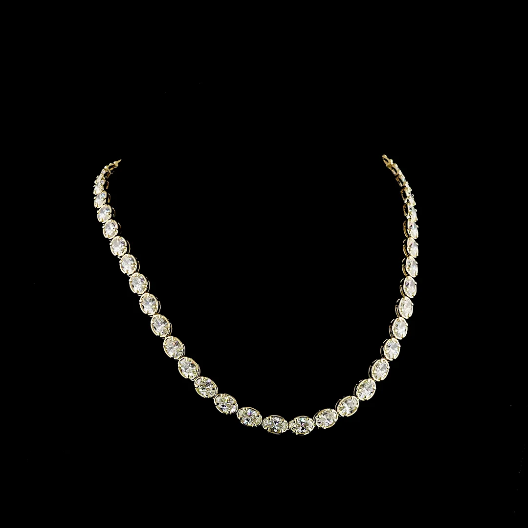 33.87 Cts 14k Yellow Gold Oval Shape Tennis Necklace
