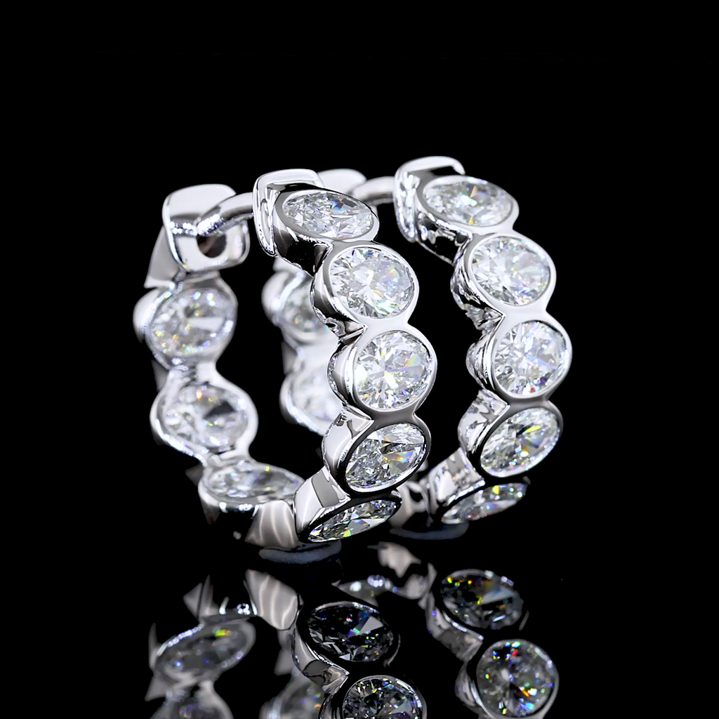 1.93 Cts 14k White Gold Oval Shape Huggies Earring