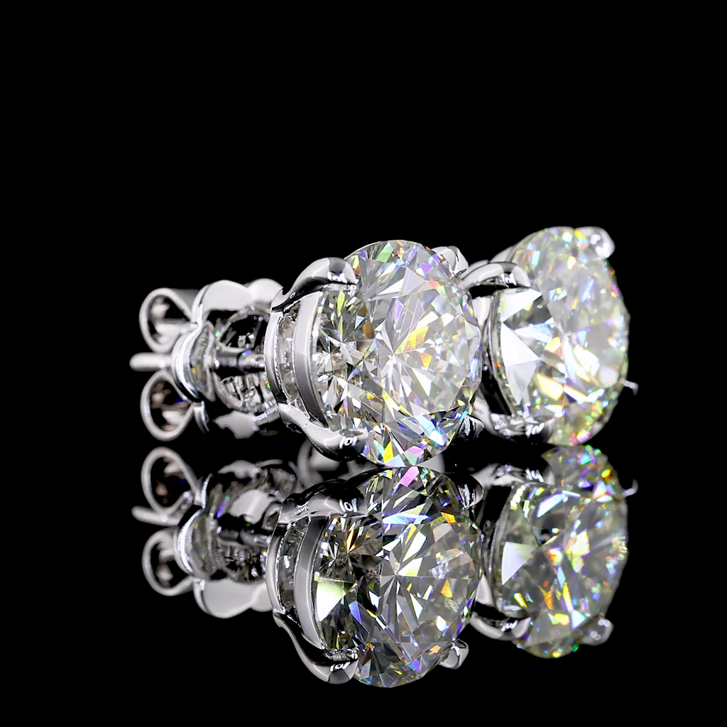 0.74 Cts 14k White Gold Round Shape Studs Earring